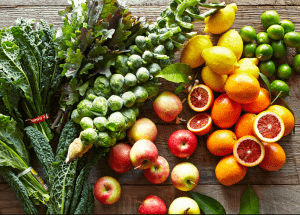 a group of fruits and vegetables on a wood surface Healthy Weight Loss Diets Paisley